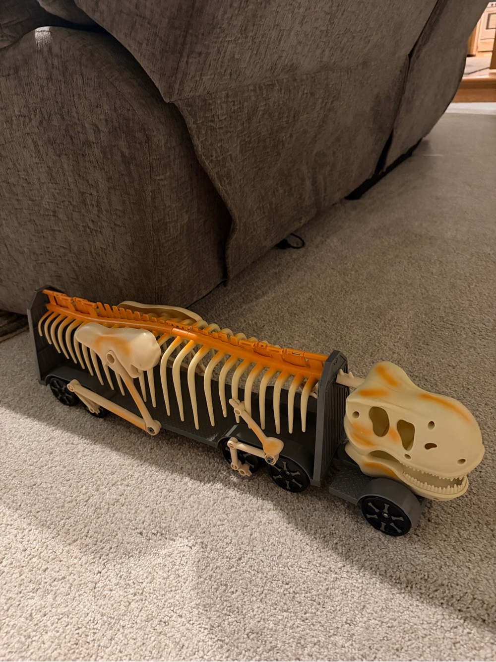 Skeletal Dinosaur Pull-Along Toy - Orange & Cream